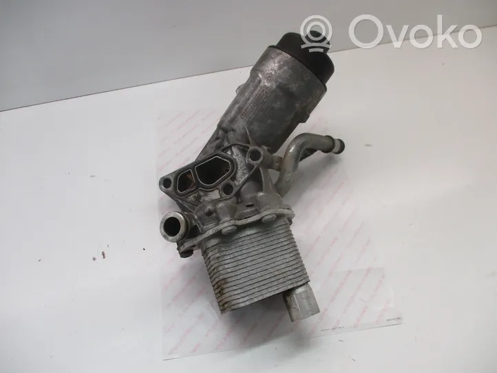 Opel Astra J Supporto di montaggio del filtro dell’olio 55566784