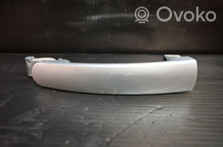 Volkswagen Tiguan Front door exterior handle 