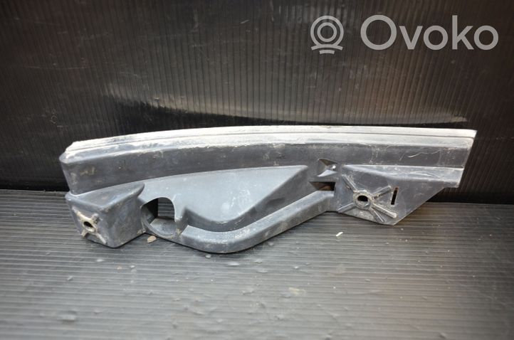 Volkswagen Touran I Uchwyt / Mocowanie lampy przedniej 1T0807889