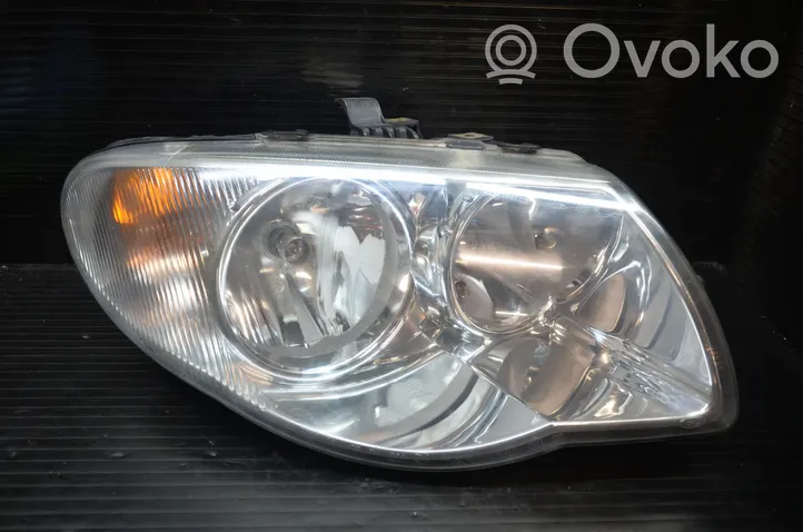 Chrysler Voyager Headlight/headlamp 04857830AC