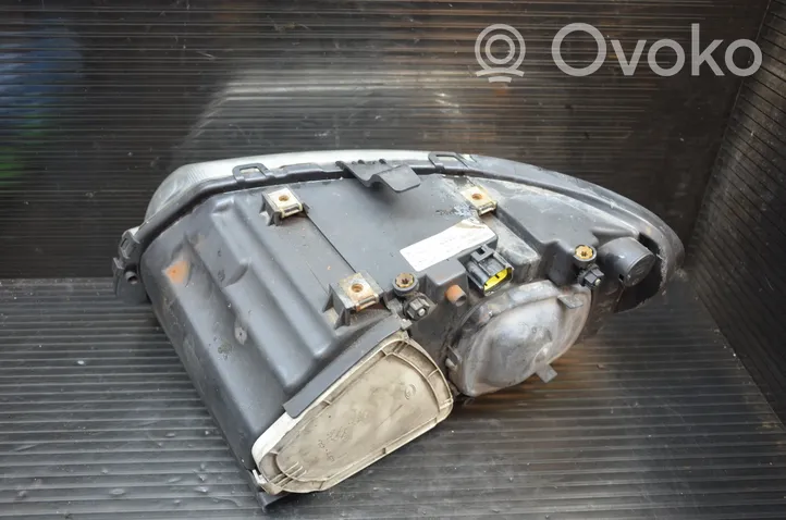 Chrysler Voyager Lampa przednia 04857830AC