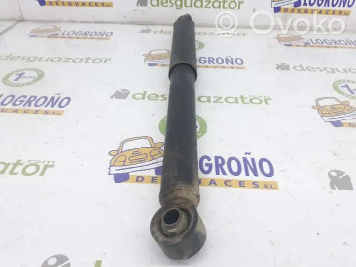 Nissan Pathfinder R50 Amortiguador trasero con muelle espiral 562004W025