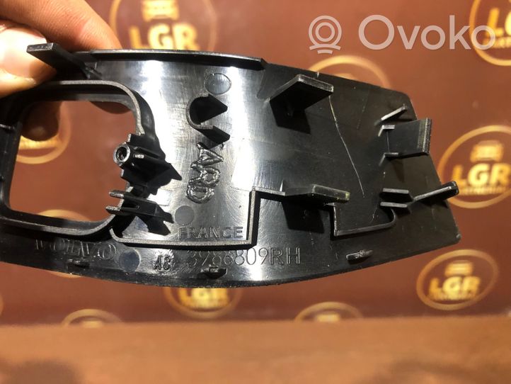 Volvo V60 Ramka przycisku otwierania szyby drzwi tylnych 3986809