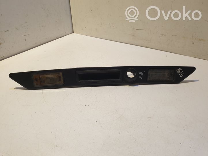 Audi A6 S6 C6 4F Lampa oświetlenia tylnej tablicy rejestracyjnej 8E0827574C