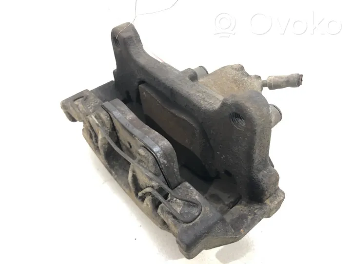 Volkswagen PASSAT B7 Front brake caliper 