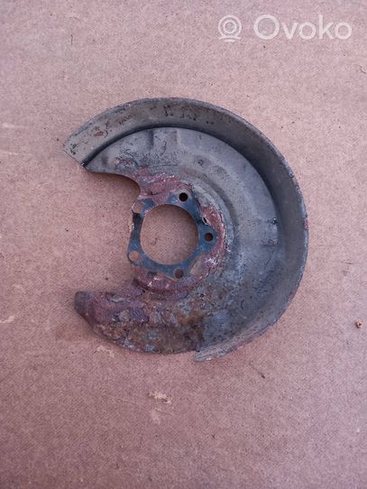 Volkswagen PASSAT B5 Rear brake disc plate dust cover 