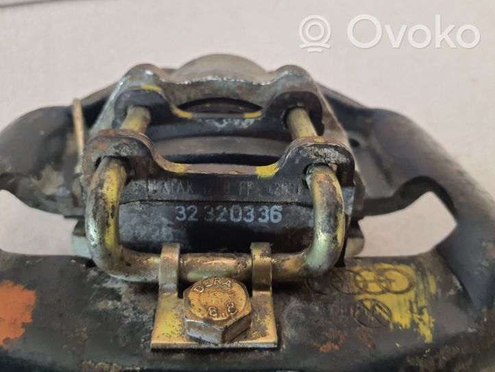 Volkswagen PASSAT Rear brake caliper 323205907