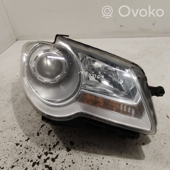 Volkswagen Touran I Lampa przednia 0301233202