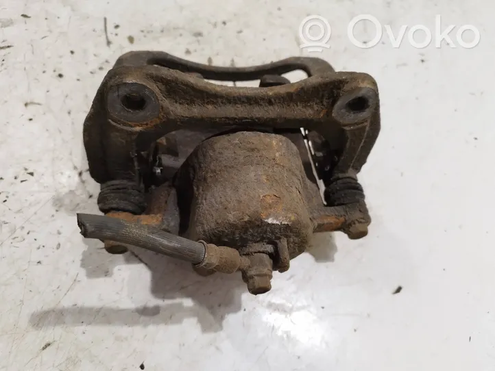 KIA Carens III Front brake caliper 