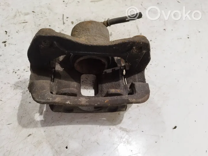 KIA Carens III Front brake caliper 