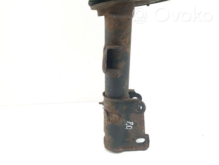 Chrysler Voyager Front shock absorber with coil spring 04743988AC