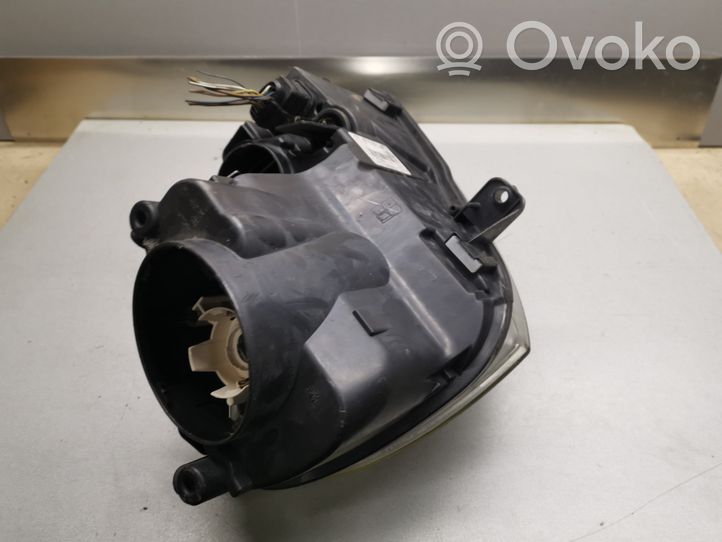 Volkswagen Jetta V Lampa przednia 1K6941005Q