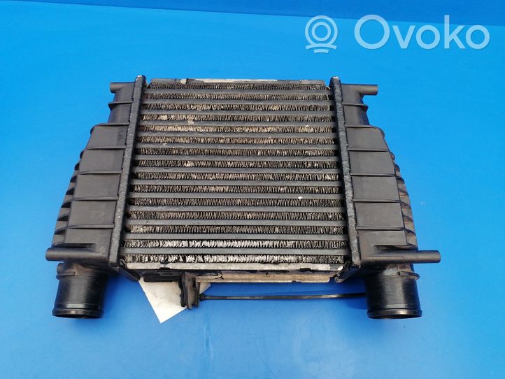 Nissan Note (E11) Chłodnica powietrza doładowującego / Intercooler 144619U20A