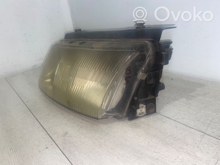 Volkswagen PASSAT B5 Lampa przednia 14869100