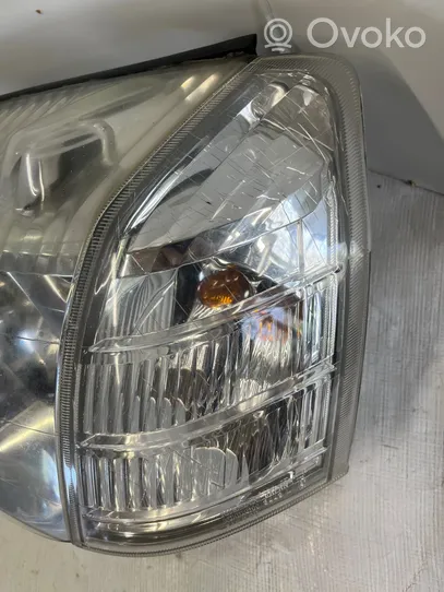 Nissan X-Trail T30 Lampa przednia 0821511A4L