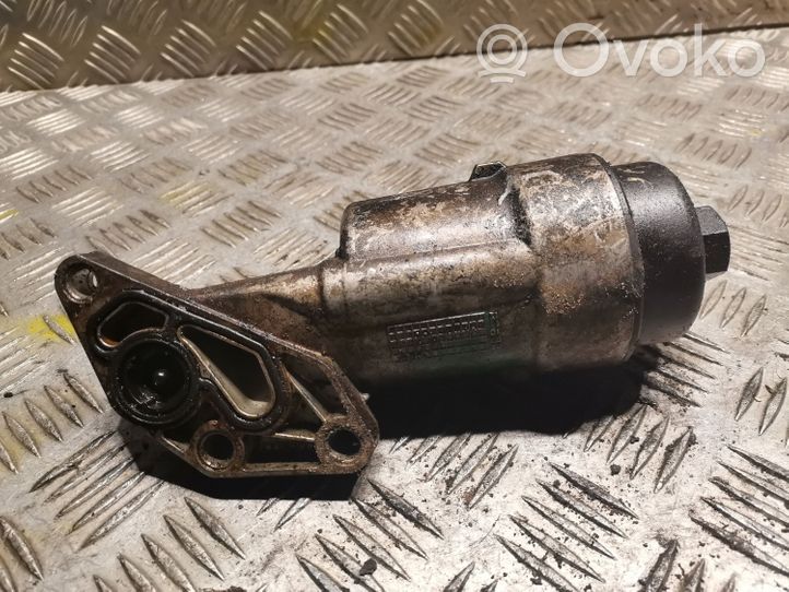 Opel Meriva B Mocowanie / uchwyt filtra oleju 55560748