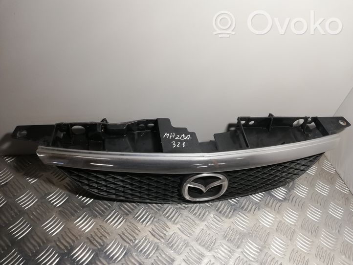 Mazda 323 Grille calandre supérieure de pare-chocs avant 