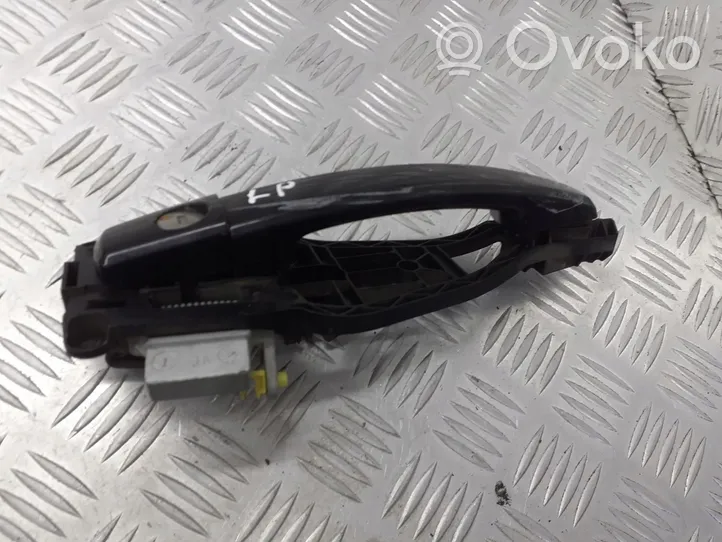 Opel Zafira B Poignée inférieure de porte avant 124463623