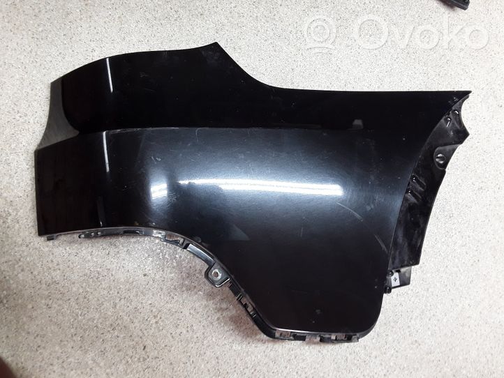 BMW X5 E70 Rivestimento del pannello parte angolare del paraurti posteriore 7158440