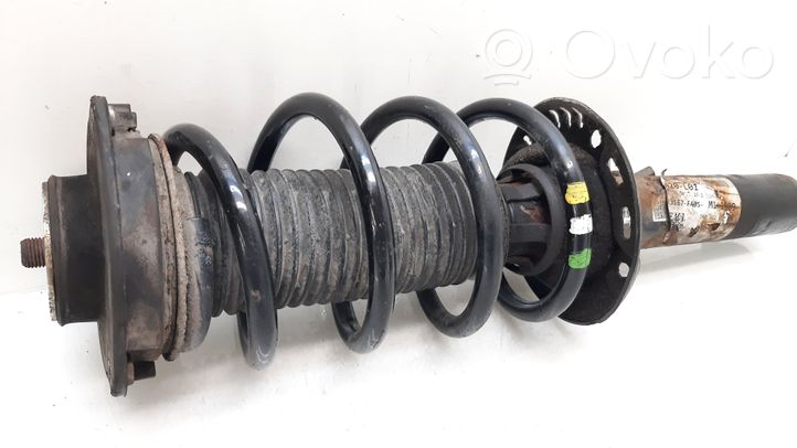 Volkswagen Tiguan Front shock absorber with coil spring 5N0412021BR