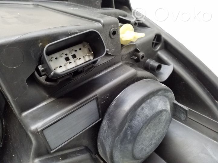 Ford Transit Courier Lampa przednia ET7613W030AJ