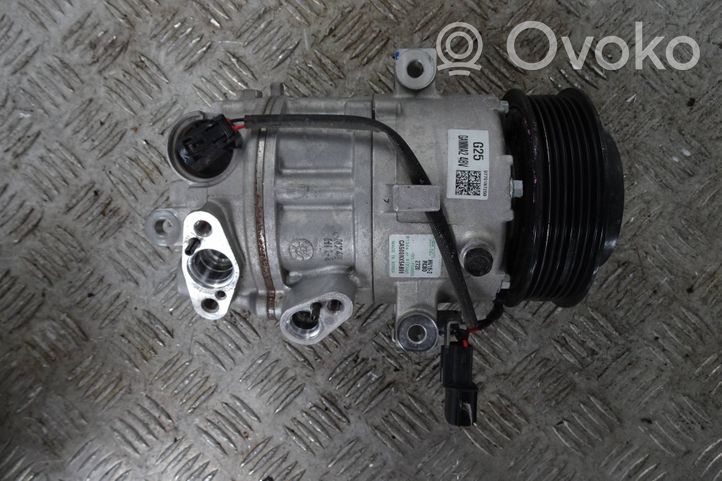 Hyundai Tucson IV NX4 Ilmastointilaitteen kompressorin pumppu (A/C) 97701-N7250