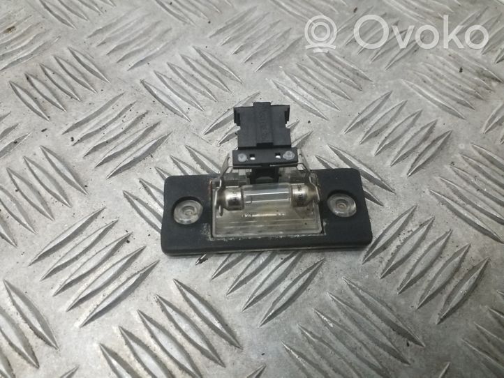 Skoda Fabia Mk2 (5J) Lampa oświetlenia tylnej tablicy rejestracyjnej 6Y0943021E