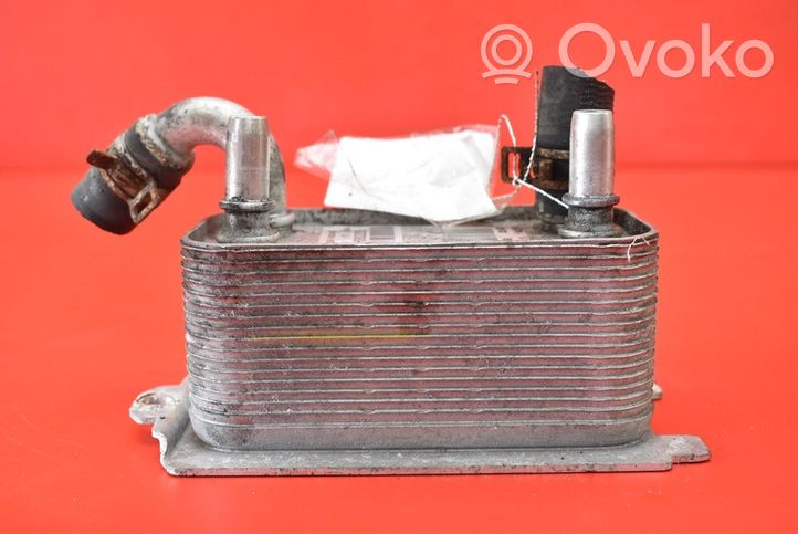 Volvo XC60 Engine oil radiator 6G91-7A095-AD