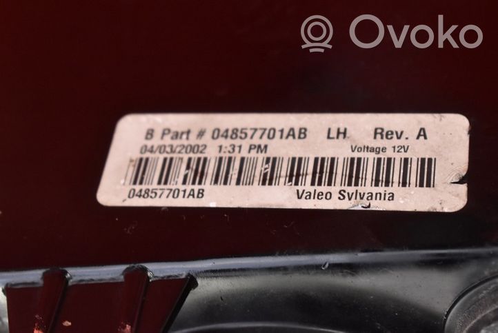 Chrysler Grand Voyager IV Lampa przednia 04857701AB