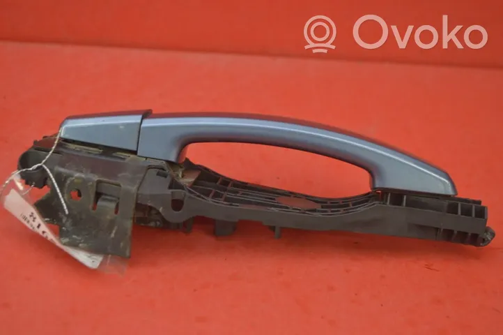 Opel Astra J Rear door exterior handle 13308536