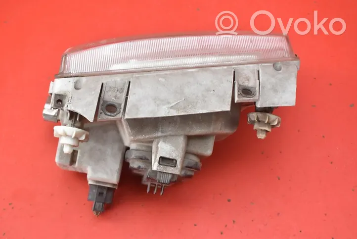 Volkswagen Polo III 6N 6N2 6NF Lampa przednia 962495-00