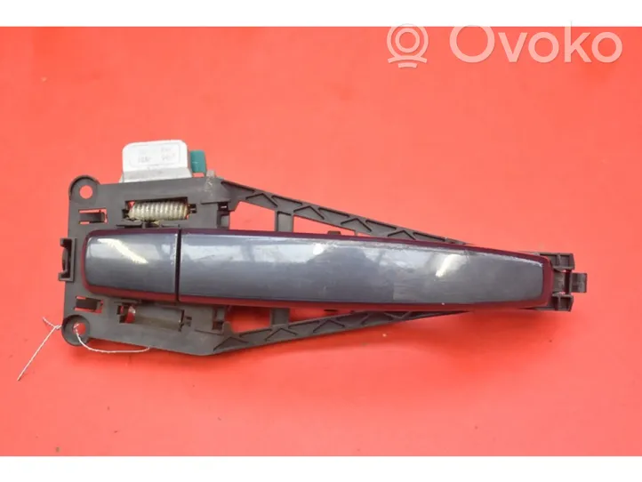 Opel Corsa D Klamka zewnętrzna drzwi przednich 24463524