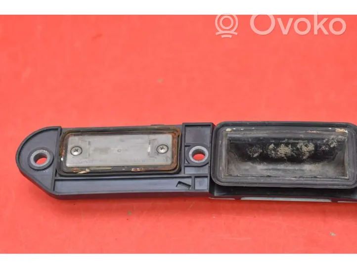 Volkswagen Golf V Lampa oświetlenia tylnej tablicy rejestracyjnej 1T0827574J