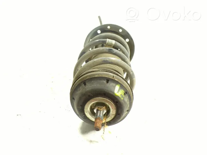 Opel Corsa D Front shock absorber with coil spring 