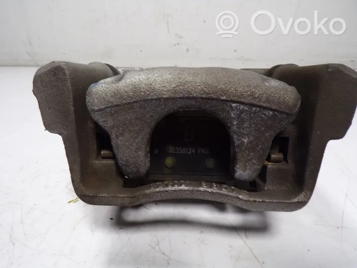 Mazda 3 III Supporto della pinza del freno posteriore 