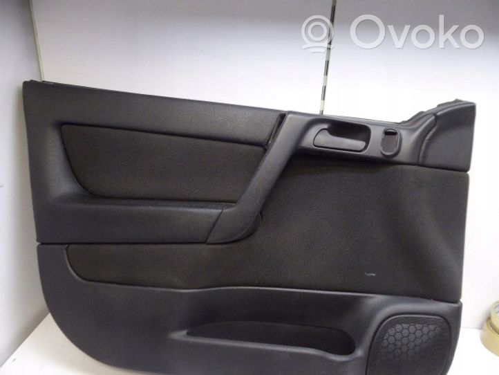 Opel Astra G Rivestimento del pannello della portiera anteriore 090561537