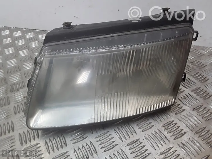 Volkswagen PASSAT B5 Lampa przednia 14869100