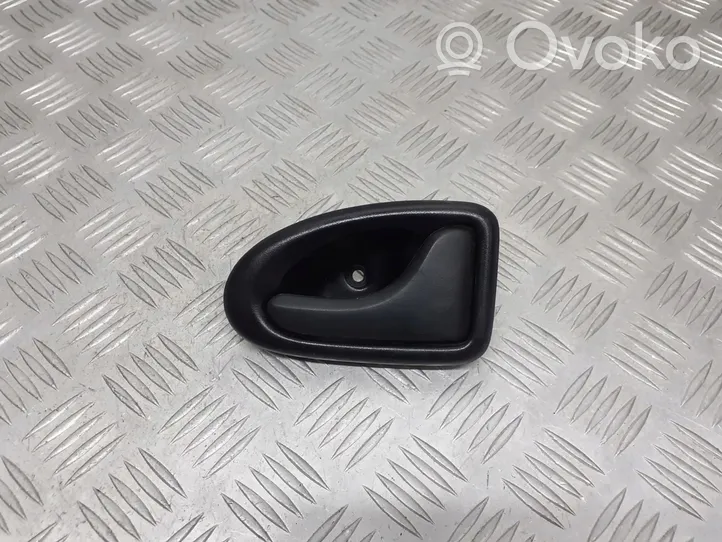 Dacia Logan I Front door interior handle 7700830079