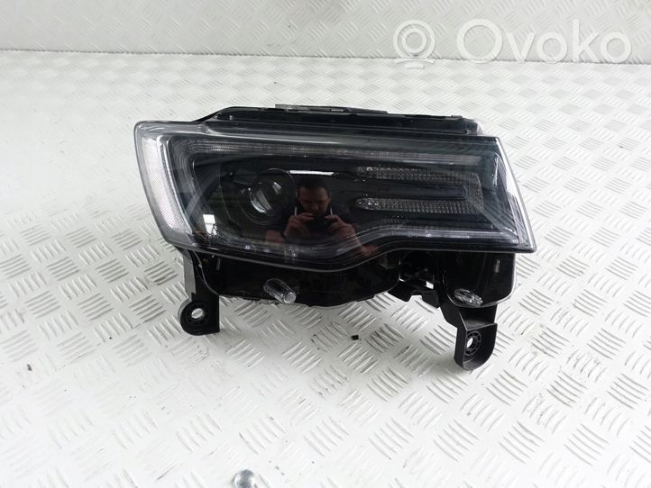 Jeep Grand Cherokee Lampa przednia 68266650AG