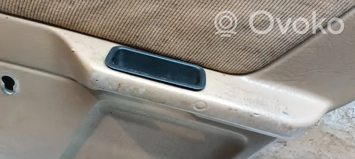 Audi 80 90 B3 Rivestimento del pannello della portiera posteriore 893867306