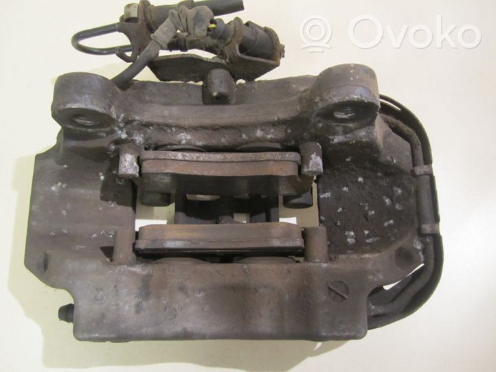 Volkswagen Touareg I Caliper del freno trasero 20767303