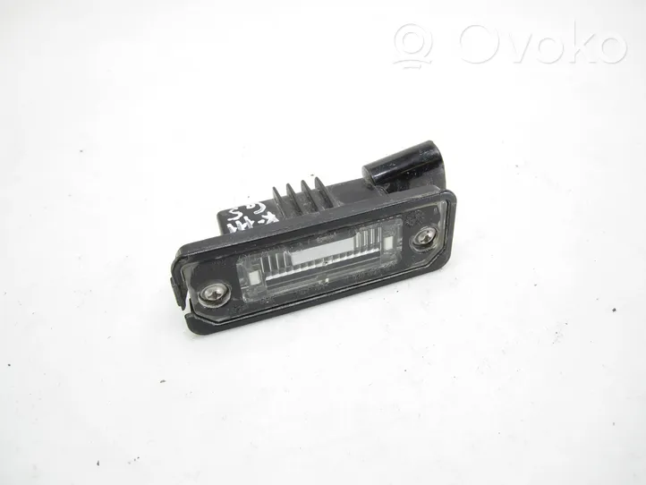 Volkswagen Golf V Lampa oświetlenia tylnej tablicy rejestracyjnej 1J6943021B