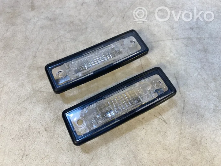 BMW 7 E23 Lampa oświetlenia tylnej tablicy rejestracyjnej 63261354665