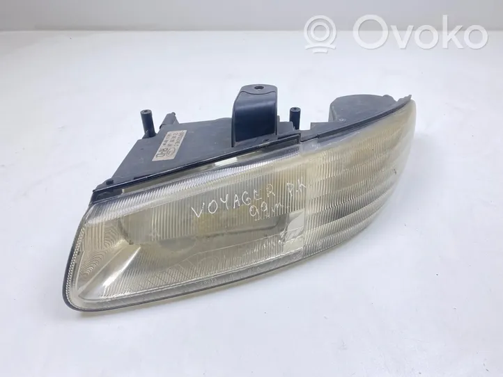 Chrysler Voyager Lampa przednia 04676521AEC