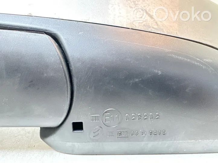 Nissan Qashqai Elektryczne lusterko boczne drzwi przednich E11036202