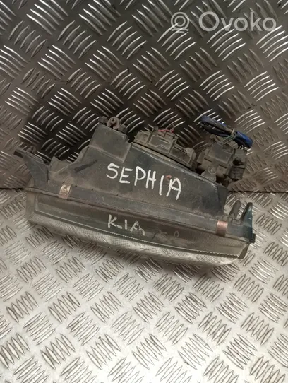 KIA Sephia Lampa przednia 0K21151020L