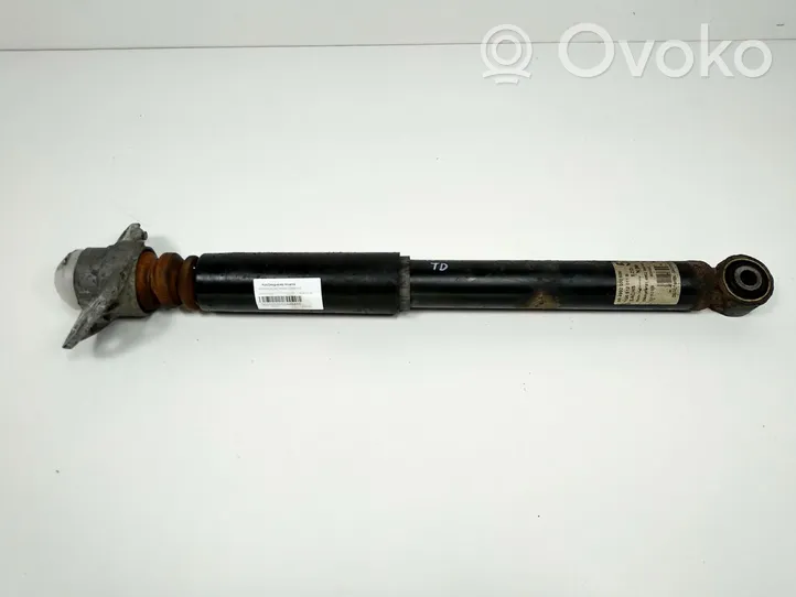 Volkswagen Eos Rear shock absorber with coil spring 1Q0512011B