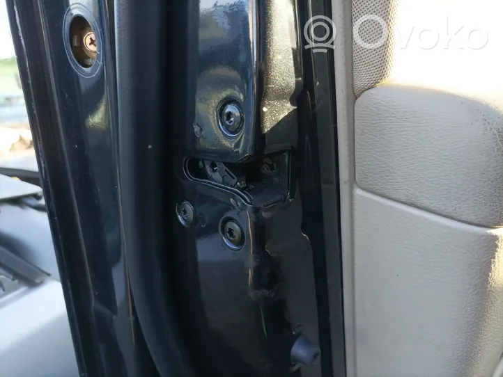 Hyundai Santa Fe Zamek drzwi przednich 813102B020