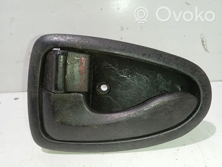 Hyundai Accent Front door interior handle 8261025000