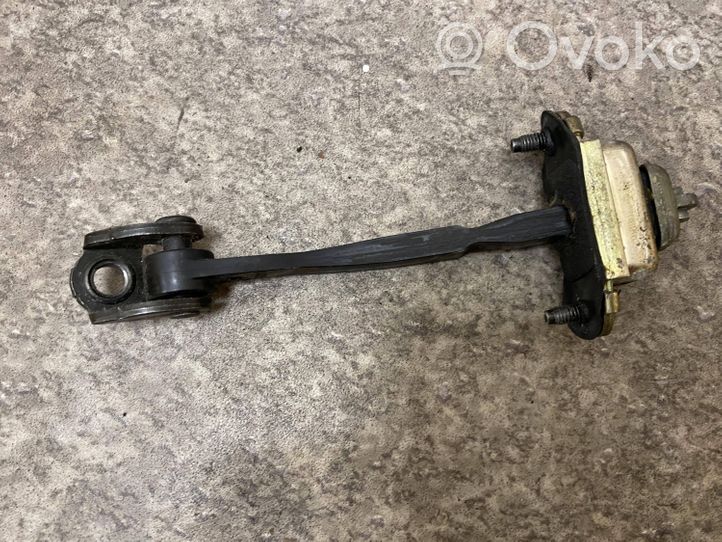 Ford Focus Front door check strap stopper XS4AA23500